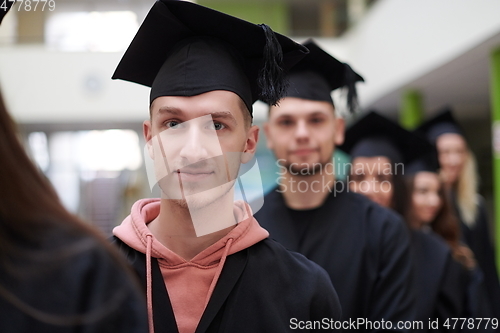 Image of Group of diverse international graduating students celebrating