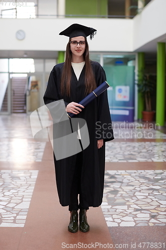 Image of portrait of student during graduation day