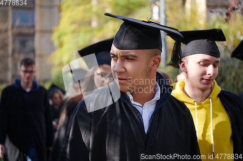 Image of Group of diverse international graduating students celebrating