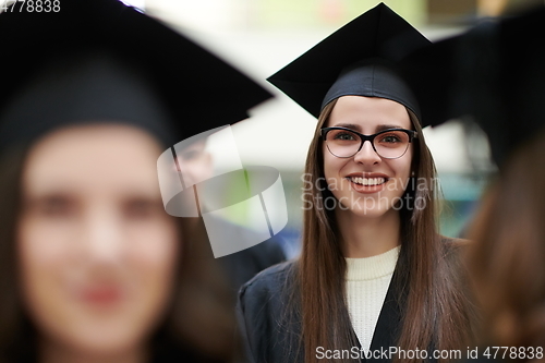 Image of Group of diverse international graduating students celebrating