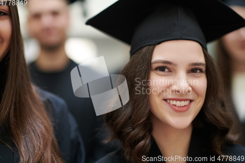 Image of Group of diverse international graduating students celebrating