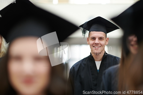 Image of Group of diverse international graduating students celebrating