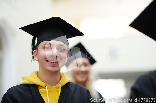 Image of Group of diverse international graduating students celebrating