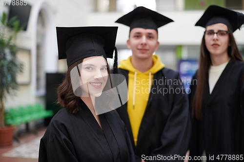 Image of Group of diverse international graduating students celebrating