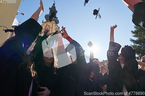 Image of Group of diverse international graduating students celebrating