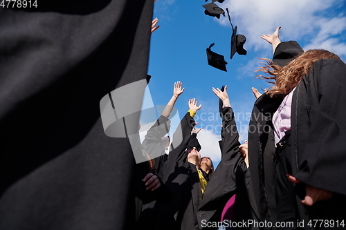 Image of Group of diverse international graduating students celebrating