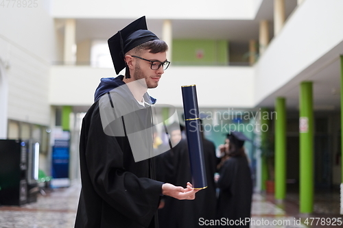 Image of portrait of student during graduation day