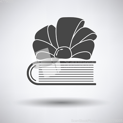 Image of Book with ribbon bow icon