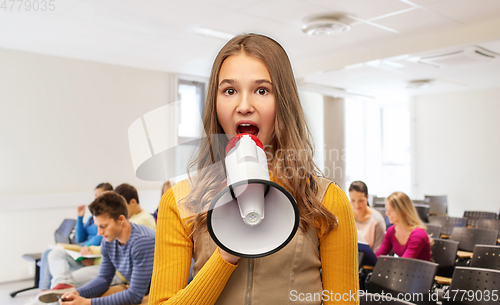 Image of teenage girl speaking to megaphone at school
