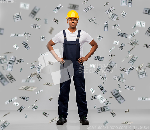 Image of happy smiling indian worker or builder in helmet