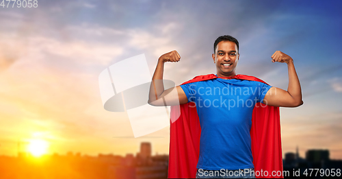 Image of indian man in superhero cape showing his power