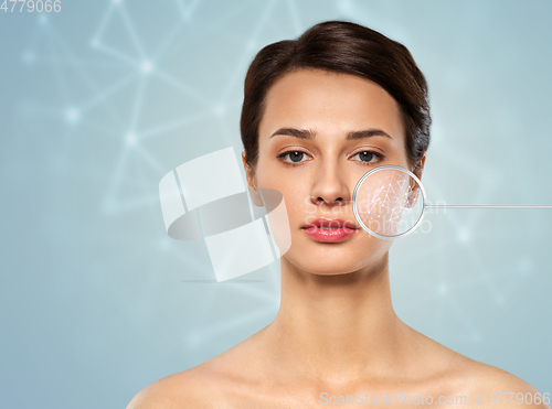 Image of woman with low poly shape projection on face skin