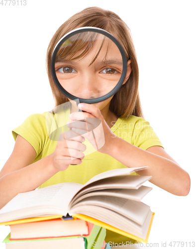 Image of Little girl is reading book