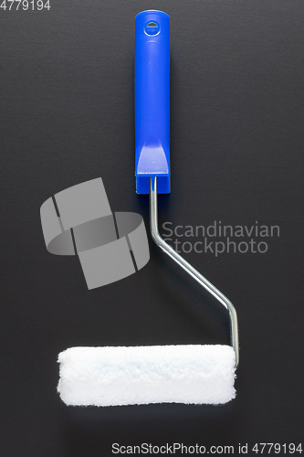 Image of painting roller isolated on black background