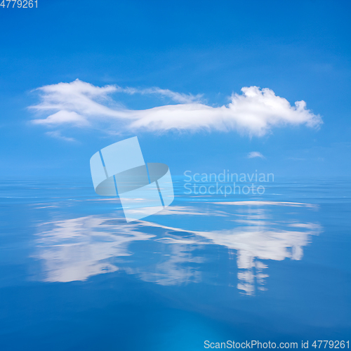 Image of blue sky with white cloud over the sea