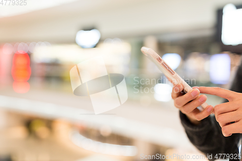 Image of Woman use of mobile phone