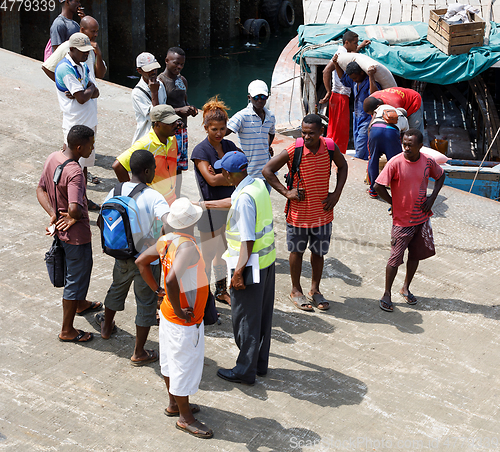 Image of Malagasy peoples waiting for boat in Nosy Be, Madagascar