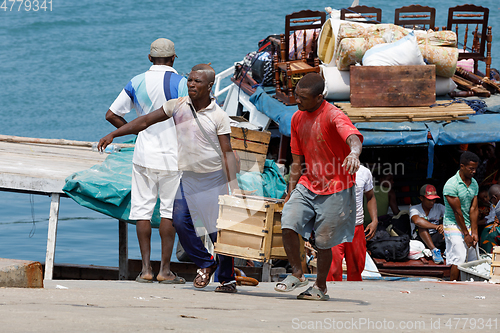 Image of Malagasy peoples loading ship in Nosy Be, Madagascar