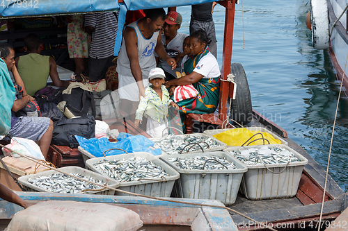Image of Malagasy peoples on loaded ship in Nosy Be, Madagascar