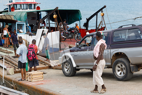 Image of Malagasy peoples loading ship in Nosy Be, Madagascar