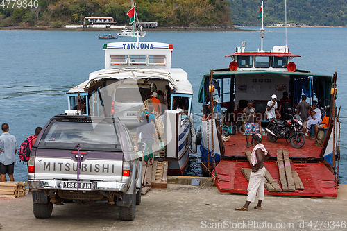 Image of Malagasy peoples loading ship in Nosy Be, Madagascar