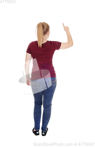 Image of Woman standing from back with finger up