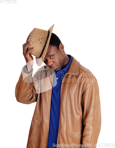 Image of Handsome man standing in brown leather jacket