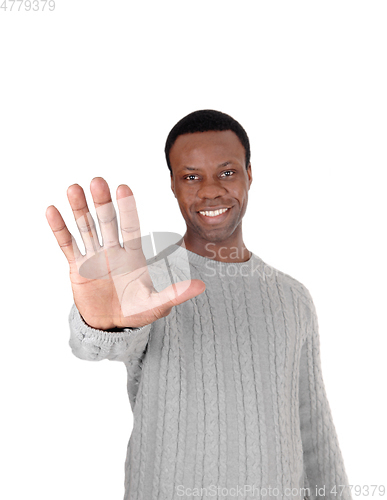 Image of Smiling black man says stop right now