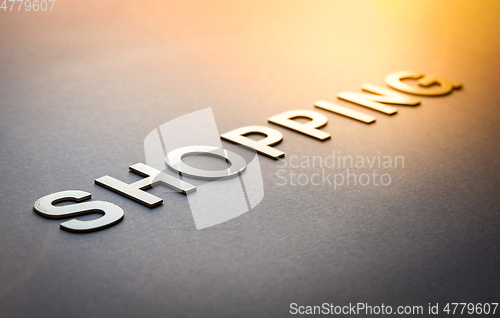 Image of Word shopping written with white solid letters