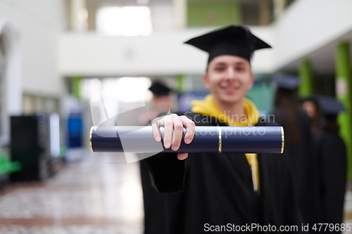 Image of portrait of student during graduation day