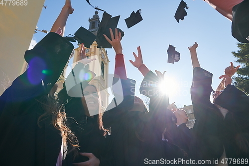 Image of Group of diverse international graduating students celebrating