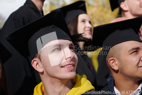 Image of Group of diverse international graduating students celebrating