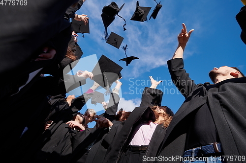 Image of Group of diverse international graduating students celebrating