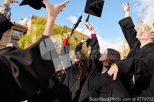 Image of Group of diverse international graduating students celebrating