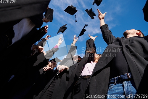 Image of Group of diverse international graduating students celebrating