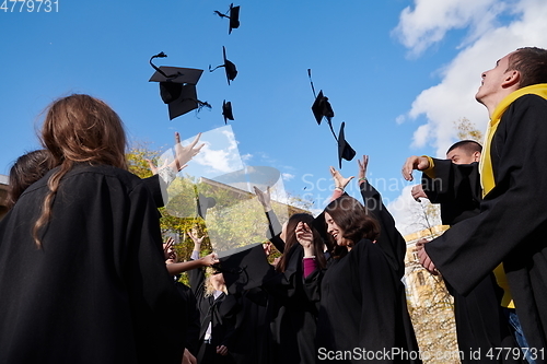 Image of Group of diverse international graduating students celebrating