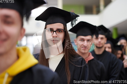 Image of Group of diverse international graduating students celebrating