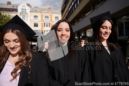 Image of Group of diverse international graduating students celebrating