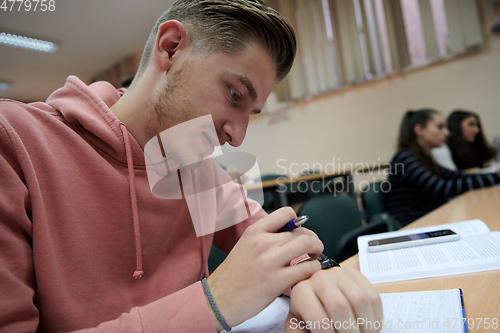 Image of the student uses a smartwatch in math class