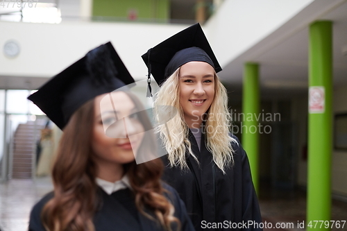 Image of Group of diverse international graduating students celebrating