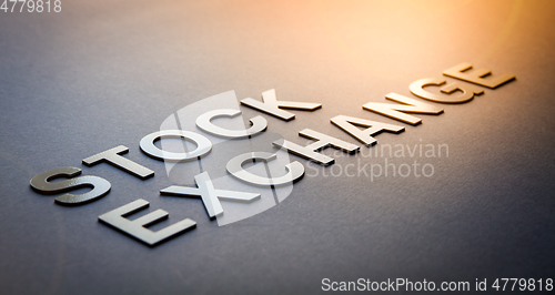 Image of Word stock exchange written with white solid letters