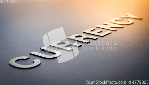 Image of Word currency written with white solid letters