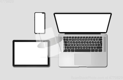 Image of Laptop, tablet and phone set mockup isolated on grey. 3D render