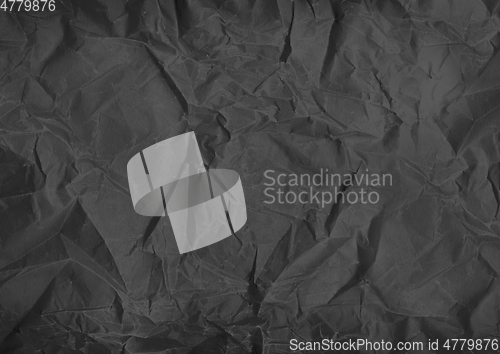 Image of black crumpled paper texture background