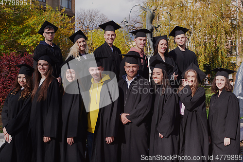 Image of Group of diverse international graduating students celebrating