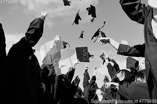 Image of Group of diverse international graduating students celebrating