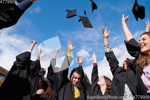 Image of Group of diverse international graduating students celebrating