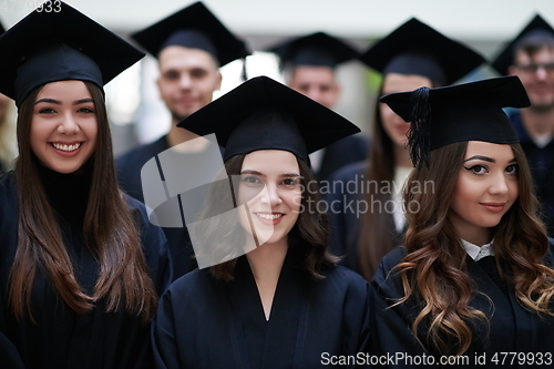 Image of Group of diverse international graduating students celebrating