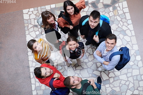 Image of group of happy young people showing their unity.