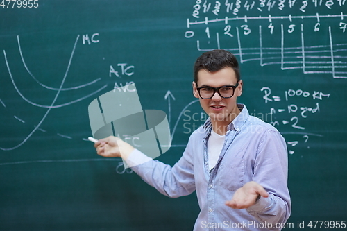 Image of the student does the task on the board